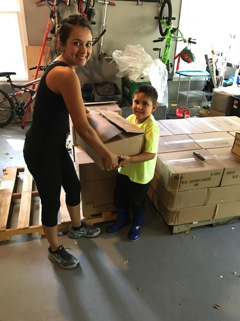 woman entrepreneur Margarita Eberline helped by son